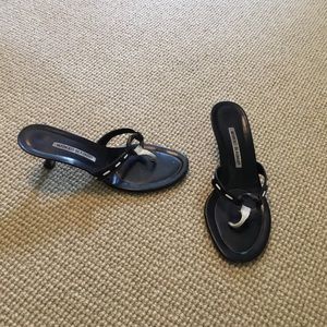 Black and white leather sandals heels